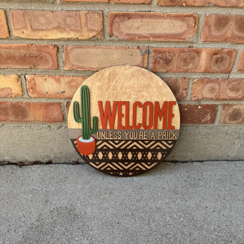 Wooden sign with cactus