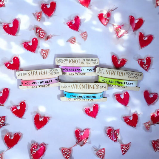 Engraved wood Valentine's Day card holding silicone affirmation bracelets